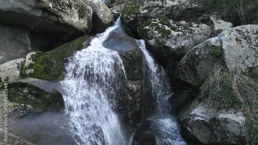 Aerial view of a small waterfall in Ourense, Spain Aerial view of a small waterfall in Ourense, Spain