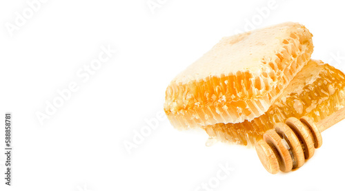 Honey in honeycomb and dipper isolated on white . Wide photo. Free space for text.