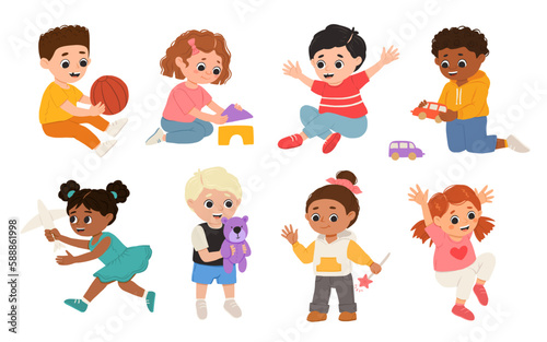 Children, kids play together having fun, fooling around in fine good mood, on playroom, playground. Preschool kids have fun. Children's activity in the kinder garden, primary school.