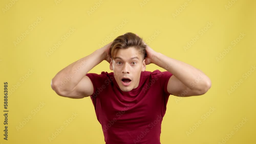 Surprised caucasian man looking at the camera