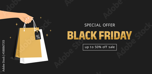 Black friday special offer banner. Female hand holding shopping bags on a black background with typography. Vector illustration in flat style