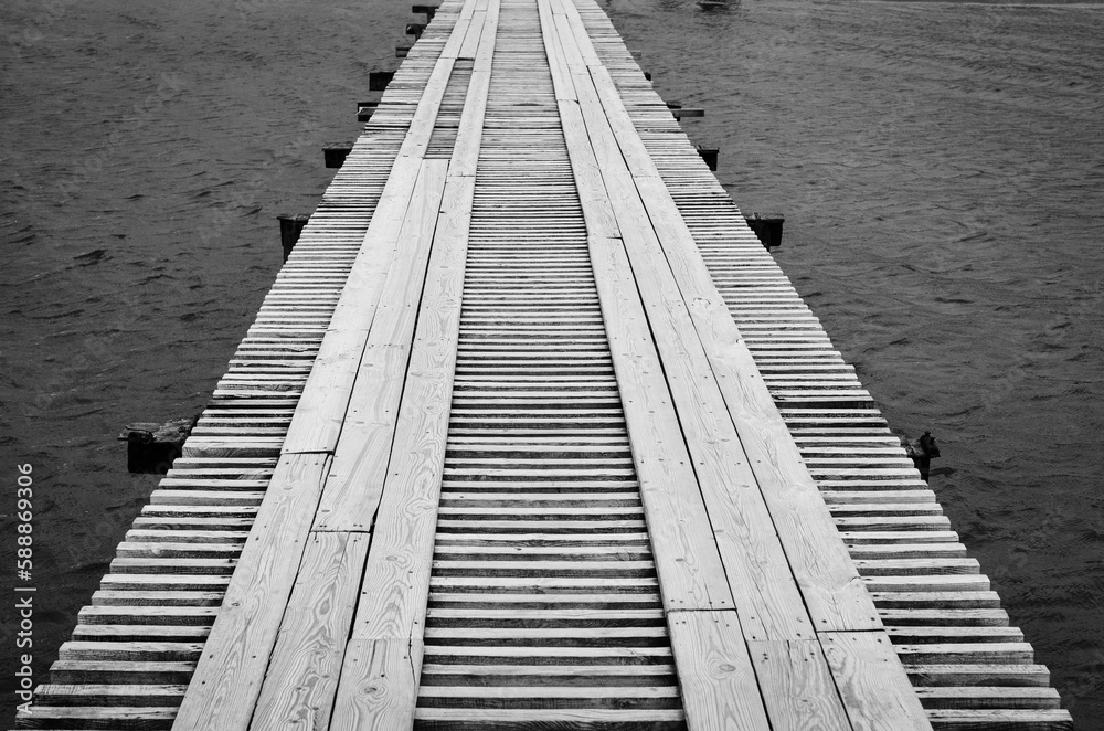 wooden bridge over the sea