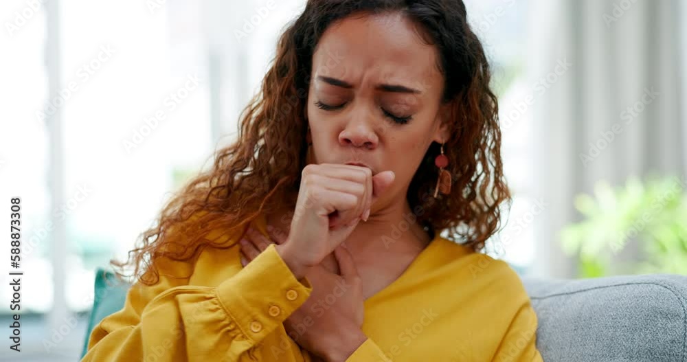 Sick, cough and woman at home with illness on a living room sofa with