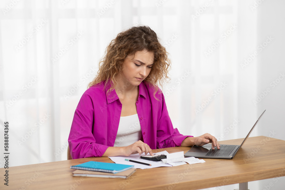 Young Female With Laptop And Calculator Accounting Taxes And Planning Budget