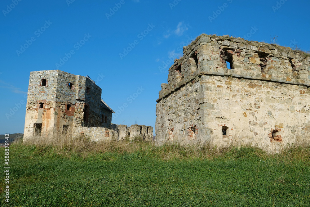 Ancient stone towers in Pniv Castle - medieval historical object, Ukraine Ancient stone towers in Pniv Castle - medieval historical object, Ukraine