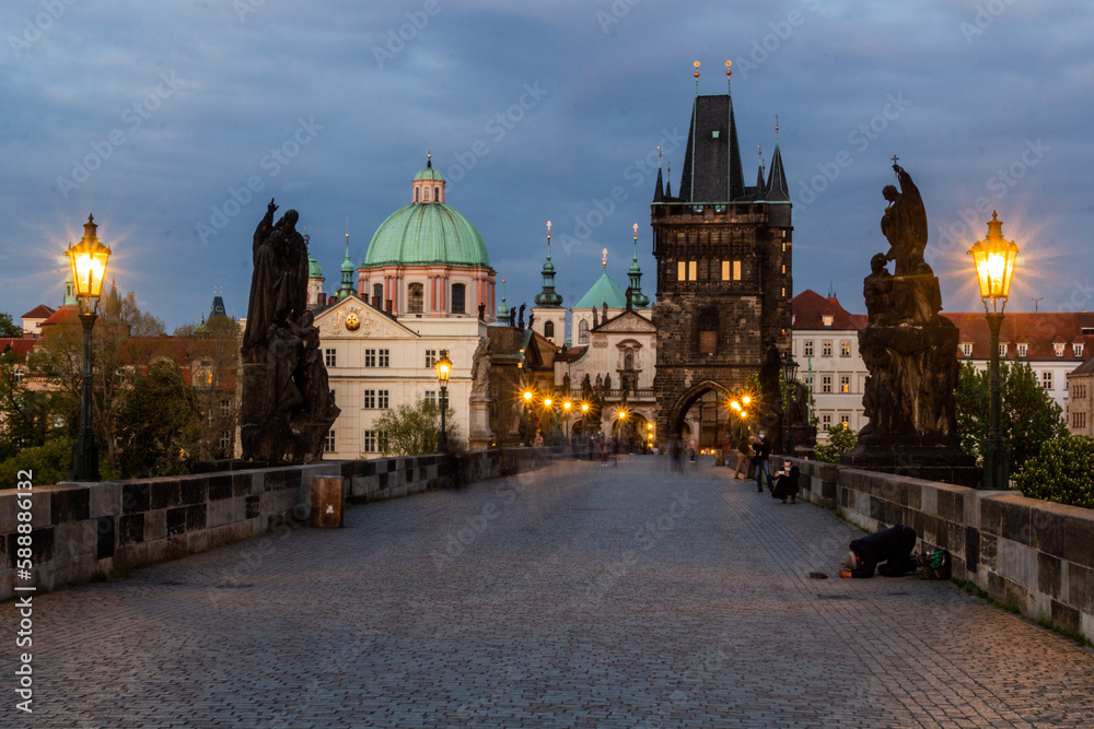 PRAGUE, CZECHIA - APRIL 27, 2020: Evening at the Charles Bridge in Prague, Czech Republic