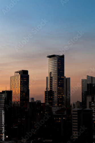 Vista do pôr do sol com os Edifício dos  bairros da Vila Olimpia e Itaim Bibi, São Paulo, Brasil photo