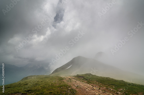 clouds over the mountains, path, hiking trail in Tatra National Park