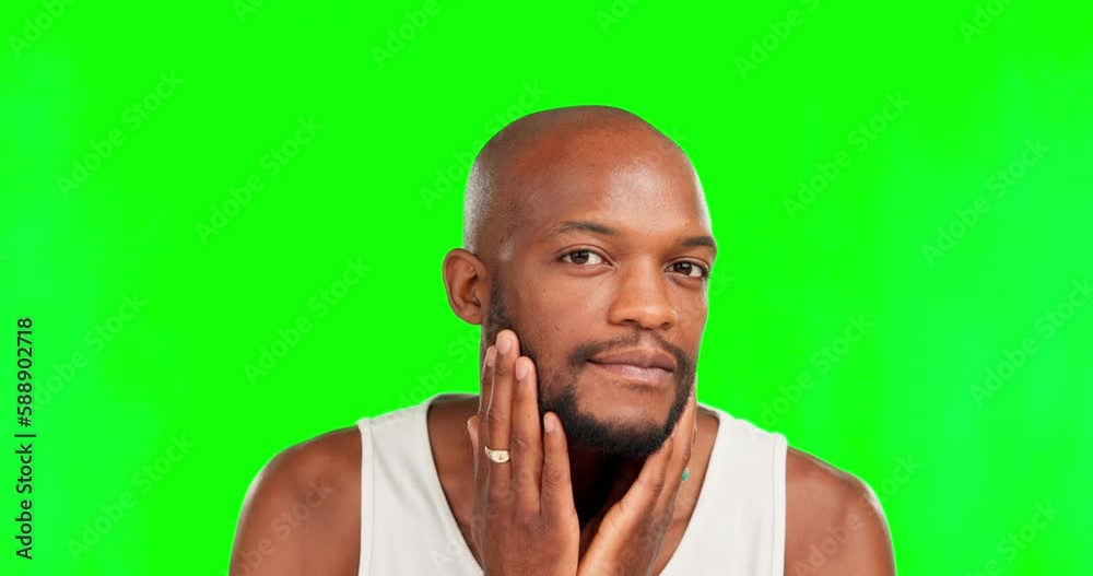Grooming, beard and face of a black man on a green screen isolated on a studio background. Feeling, looking and portrait of an African guy touching his facial hair for maintenance on a backdrop Grooming, beard and face of a black man on a green screen isolated on a studio background. Feeling, looking and portrait of an African guy touching his facial hair for maintenance on a backdrop