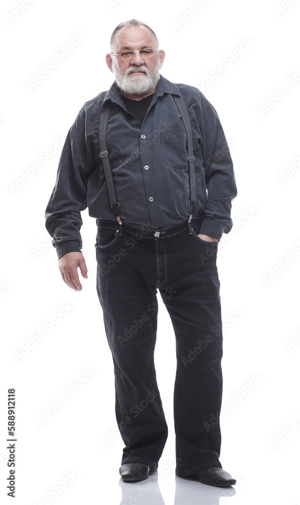 handsome, bearded man in trousers with suspenders. isolated on a white handsome, bearded man in trousers with suspenders. isolated on a white