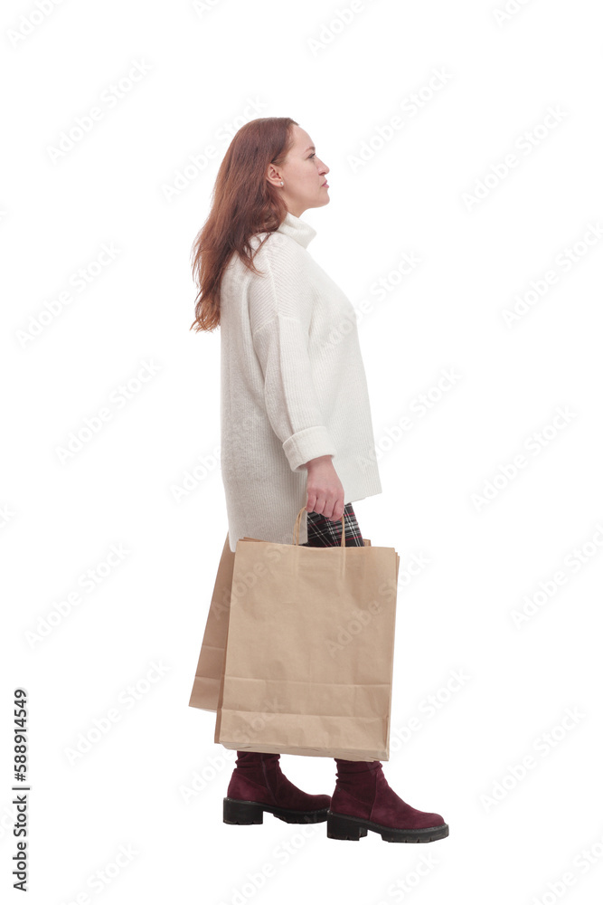casual woman with shopping bags .isolated on a white background. casual woman with shopping bags .isolated on a white background.