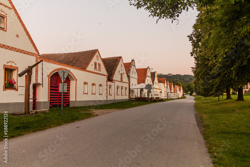 Fototapeta Naklejka Na Ścianę i Meble -  Traditional houses of rural baroque style in Holasovice village, Czech Republic