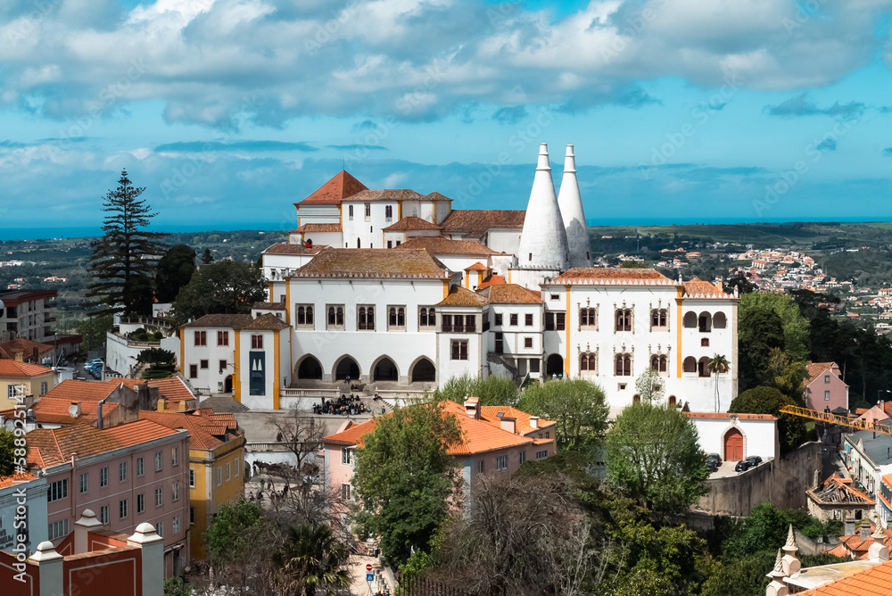 Sintra, Lisboa, Portugal. April 10, 2022: Panoramic landscape of the national palace of sintra and blue sky.