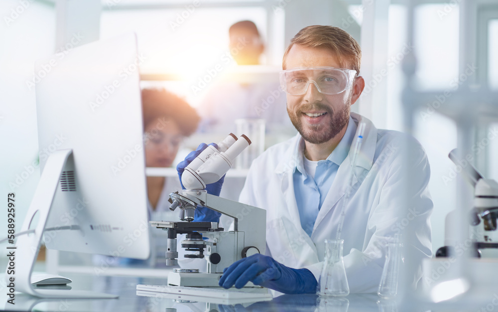 In a Modern Laboratory Research Scientist Conducts Experiments In a Modern Laboratory Research Scientist Conducts Experiments