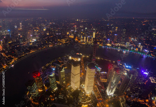 Photography Night aerial view of skyscrapers in Shanghai with Huangpu river, China