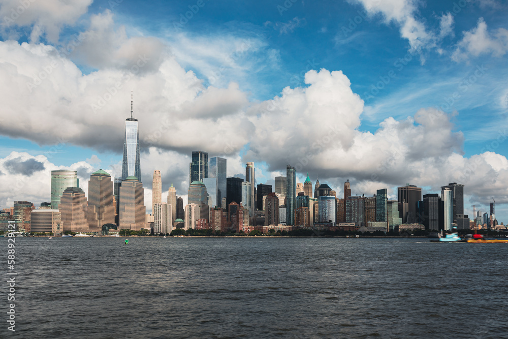 Hudson River and Lower Manhattan Skyline, New York City with Beautiful puffy Clouds