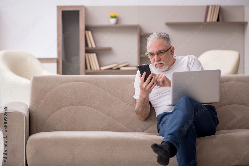 Old man sitting at home Old man sitting at home