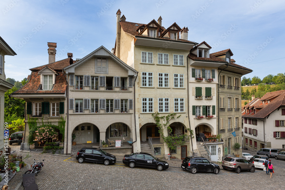 Naklejka premium Apartment and office buildings on Nydeggstalden st in Bern, Switzerland
