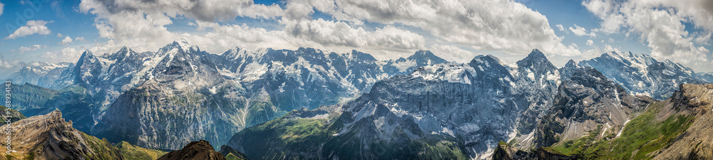 View of the Swiss Alps from the top of the Schilthorn during a warm summer