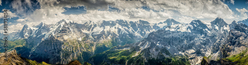 View of the Swiss Alps from the top of the Schilthorn during a warm summer