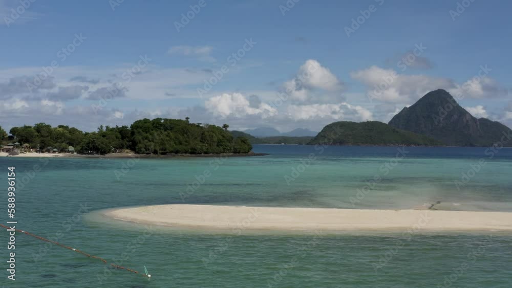 Aerial view of a catamaran moored along a white sand beach on Bohol Island, Central Visayas region, Philippines,. Aerial view of a catamaran moored along a white sand beach on Bohol Island, Central Visayas region, Philippines,.