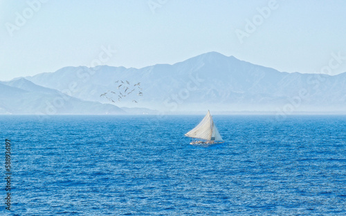 Sailboat on Foggy Sea