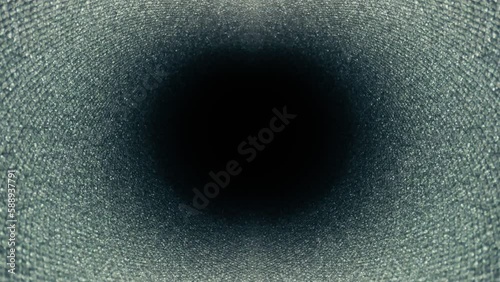 Moving towards black void in tube texture resembling scales