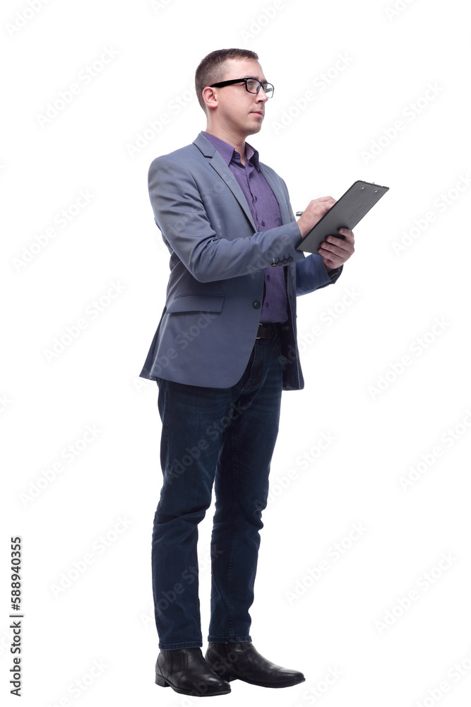 Handsome happy businessman or banker taking notes on clipboard as paperwork Handsome happy businessman or banker taking notes on clipboard as paperwork