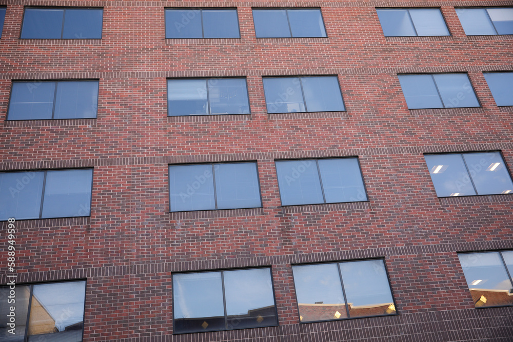 Old brick buildings symbolize nostalgia, history, durability, and a