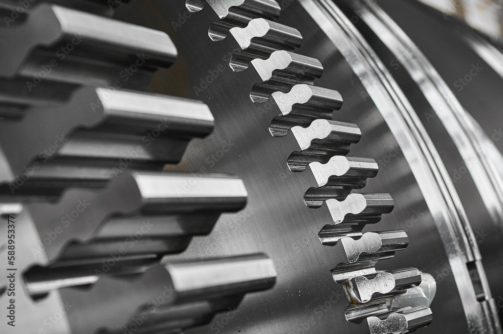Metal shaft of steam turbine without blades in workshop Metal shaft of steam turbine without blades in workshop