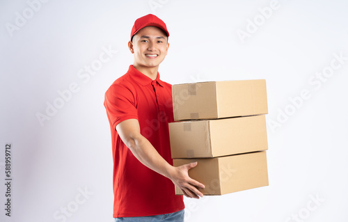 portrait of asian delivery man on white background