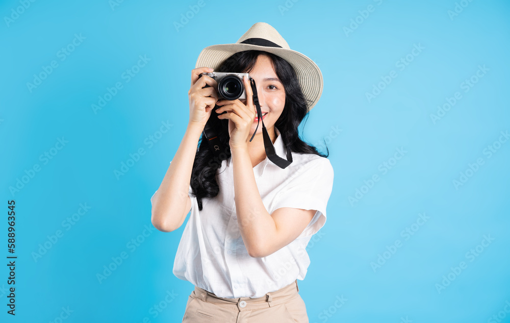 Portrait of beautiful asian girl traveling, isolated on white background