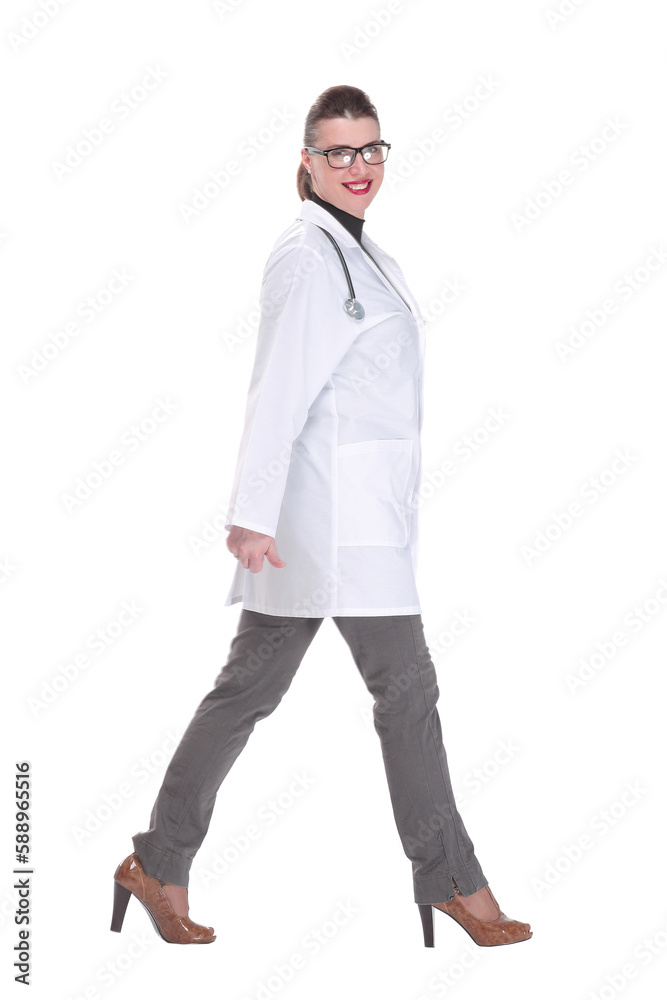 Full length portrait of medical doctor woman going sideways Full length portrait of medical doctor woman going sideways