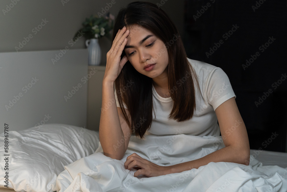 Stressed can not sleep asian young woman, girl sitting on bed in bedroom at home, suffering from insomnia, awake at night in bedroom, tired. Frustrated with problem, exhausted on nightmares. Stressed can not sleep asian young woman, girl sitting on bed in bedroom at home, suffering from insomnia, awake at night in bedroom, tired. Frustrated with problem, exhausted on nightmares.
