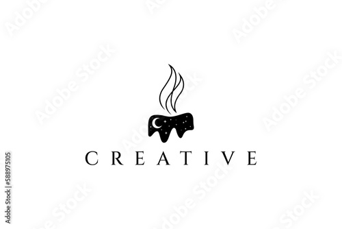 candle logo at night with crescent moon and star sprinkles
