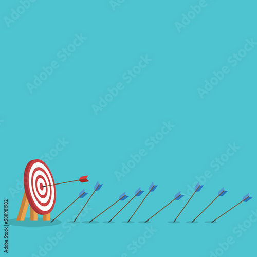 Business challenge failure and success concept. Blue arrows missed hitting target and only red one hits the center.	