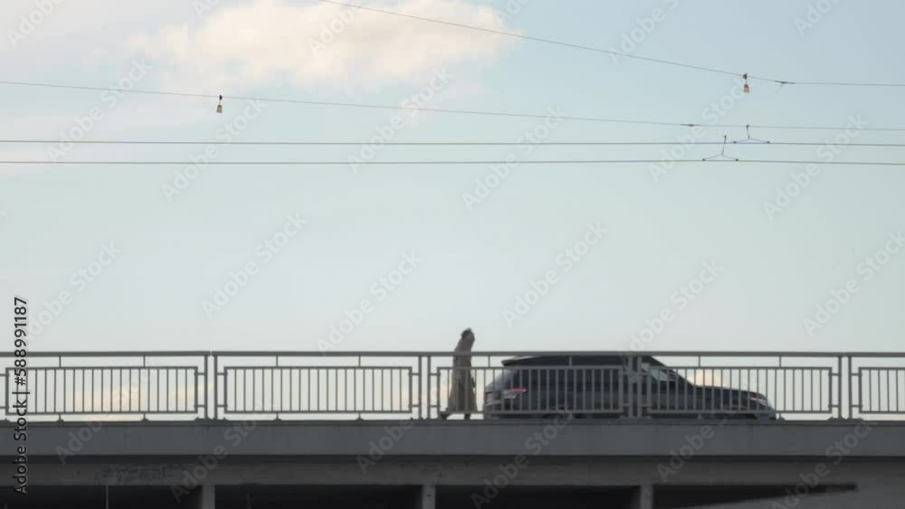 Pedestrian and tram crossing Štefanik Bridge in Prague, Czechia Pedestrian and tram crossing Štefanik Bridge in Prague, Czechia