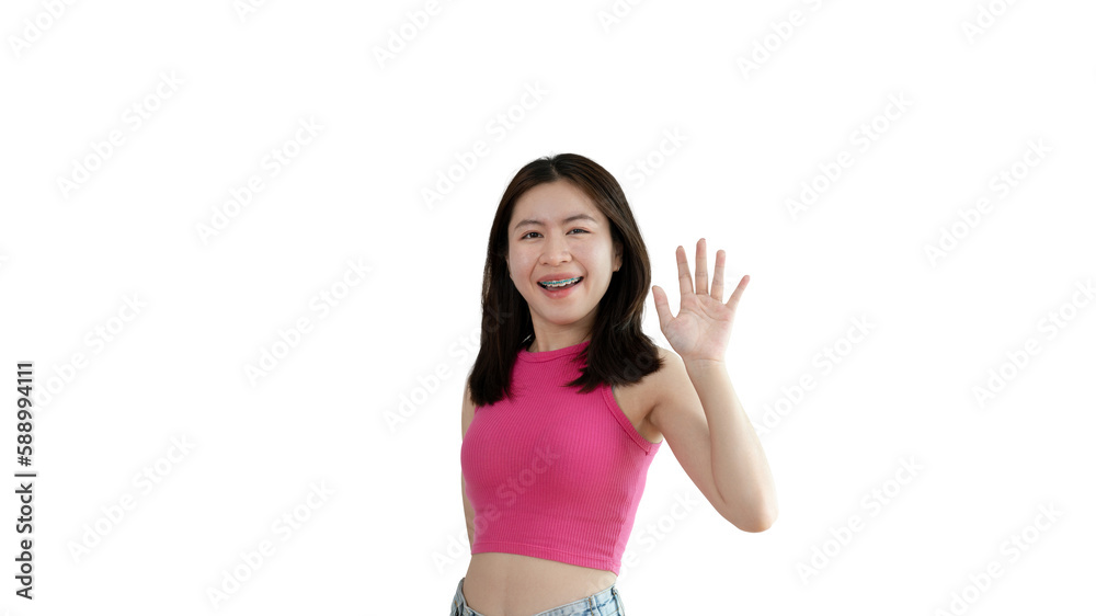 Waving hand in hi, Asian woman smiling friendly greeting, Hello,nice to meet you,say hi, Say hi and greet you, Welcome new people Join a multicultural team, Goodbye, Isolated on yellow background. Waving hand in hi, Asian woman smiling friendly greeting, Hello,nice to meet you,say hi, Say hi and greet you, Welcome new people Join a multicultural team, Goodbye, Isolated on yellow background.