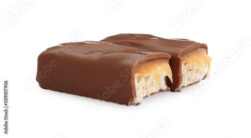 Pieces of chocolate bar with caramel on white background