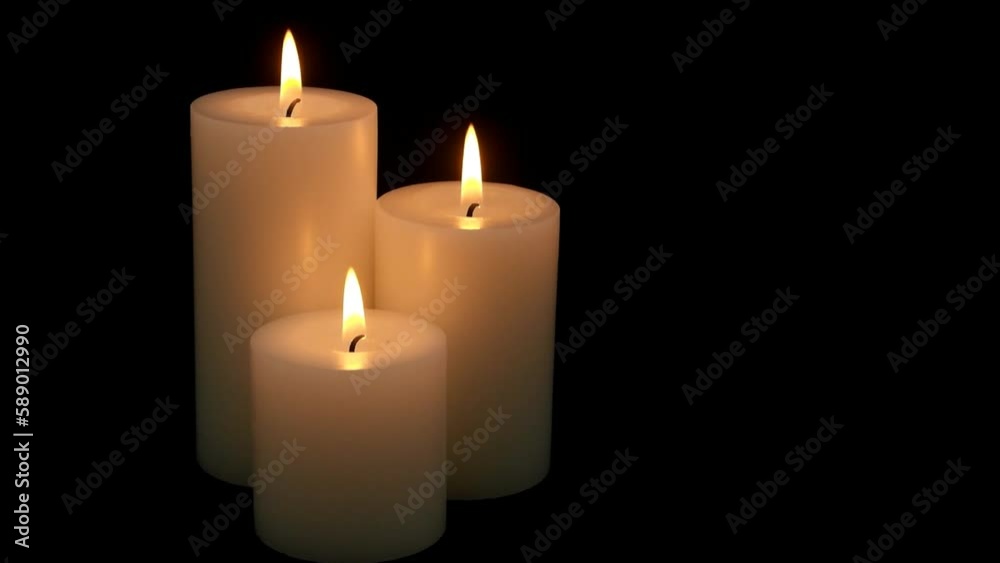 Three whole candles melting on black background. Room for text. Three whole candles melting on black background. Room for text.