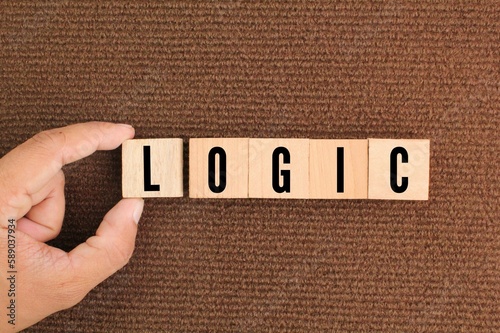 wooden cube with logic words. logical concepts or think correctly. mind test concept. 