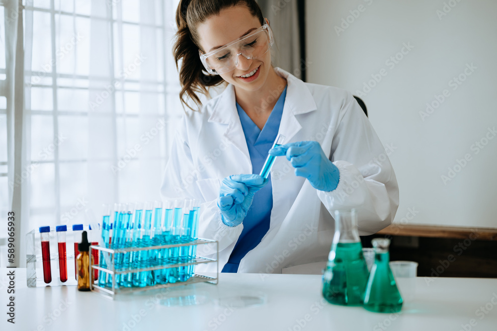 Male biotechnologist testing new chemical substances in a laboratory. Male biotechnologist testing new chemical substances in a laboratory.