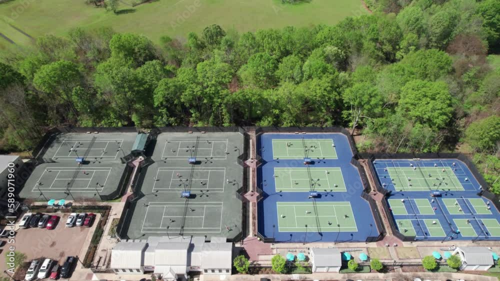 Gorgeous tennis complex, aerial shot of tournament action. 4K Gorgeous tennis complex, aerial shot of tournament action. 4K