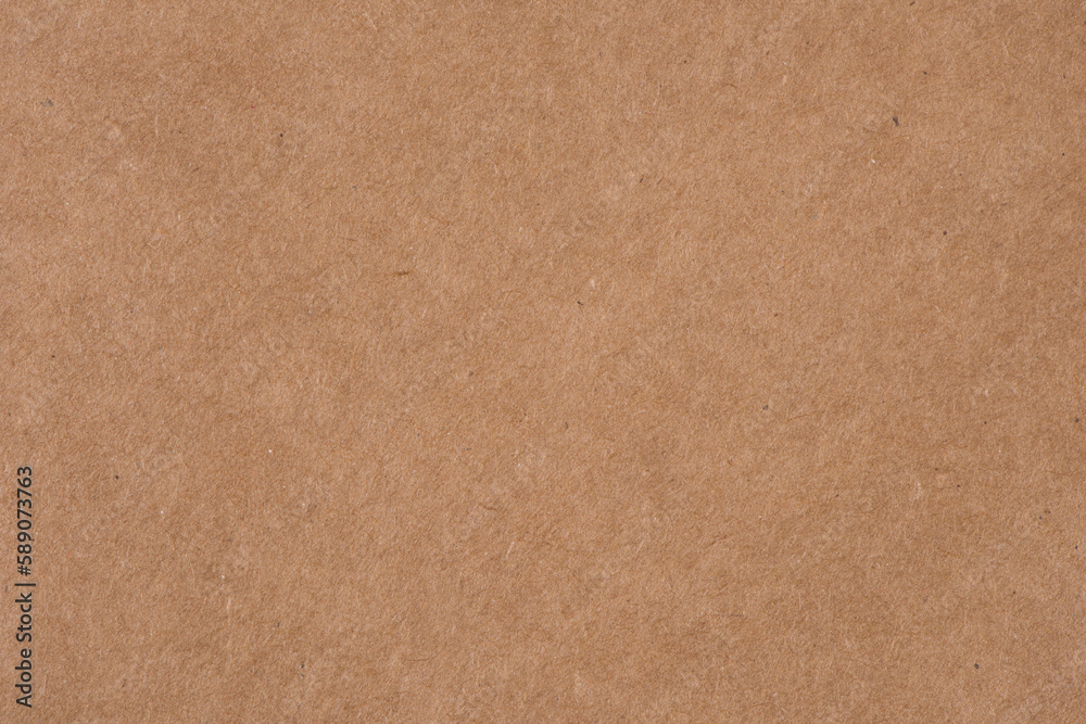 Fototapeta premium Brown recycled cardboard paper textured background
