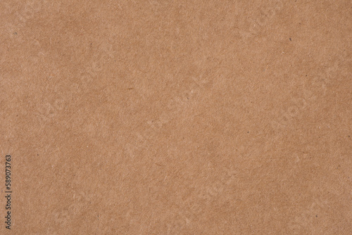 Brown recycled cardboard paper textured background