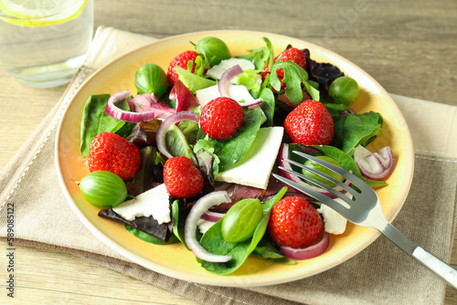 Concept of tasty food  salad with strawberry