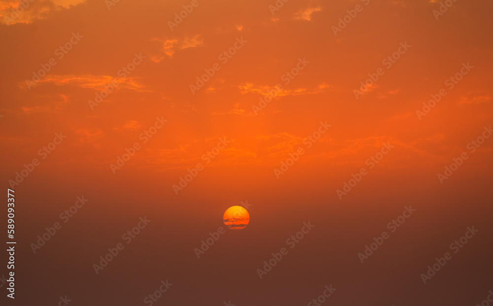 Dubai marina sunset. Beautiful orange sky sunset landscape over the sea from United Arab Emirates.