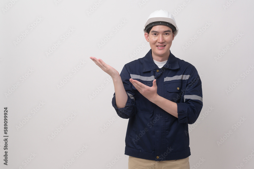 Portrait of male engineer wearing a protective helmet over white background studio. Portrait of male engineer wearing a protective helmet over white background studio.