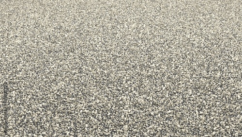 Small Crushed rock stone road building material gravel texture. Small stone construction material rock. A pile of rocks and pebbles on the ground, Material coral stone for the road foundation layer,