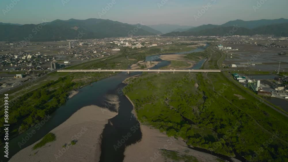 春の福井市 九頭竜川からの景色 北陸新幹線 高架 ドローン 空撮 4K